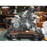 A 19TH CENTURY 'CHRISTOPHER COLUMBUS' MANTEL CLOCK with a circular dial beside a spelter sculpture