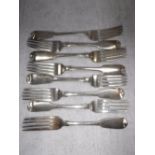 EIGHT GEORGE III AND SIMILAR TABLE FORKS, various dates and makers