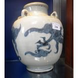 A CHINESE POURING VESSEL decorated with four-toed dragons