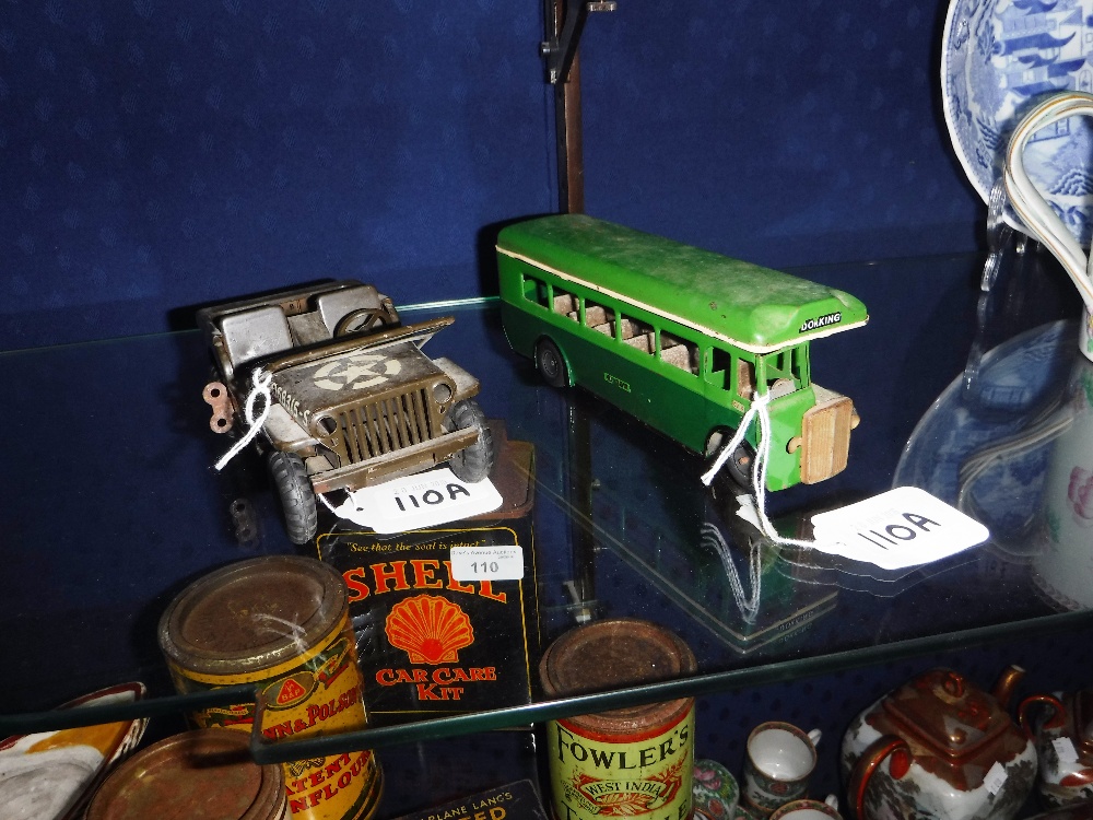 MINIC TOYS: A TIN PLATE GREEN-LINE CLOCKWORK BUS and a Tri-Ang tin plate American jeep (2)