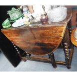 AN OAK GATELEG TABLE on bobbin-turned legs, early 18th century and later