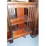 AN EDWARDIAN MAHOGANY REVOLVING BOOKCASE 19.5" wide