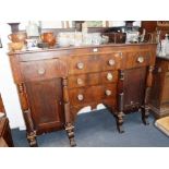 A LARGE AMERICAN MAHOGANY SIDEBOARD with a raised top above an arrangement of drawers and