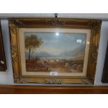 A 19TH CENTURY WATERCOLOUR of a lake scene with cattle in a gilt frame