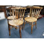 THREE TURNED KITCHEN CHAIRS with solid seats