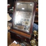 A GEORGE III MAHOGANY DRESSING TABLE MIRROR fitted a single long drawer on bracket feet