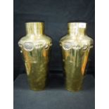 LIBERTY & CO: A PAIR OF BRASS ART NOUVEAU VASES of tapering shoulder design with " Glasgow" style
