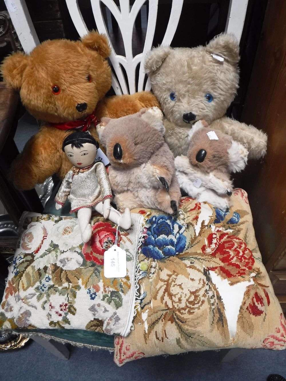 TWO TEDDY BEARS, a doll, two koalas and two needlework cushions