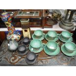 A SET OF SIX ORIENTAL GREEN GLAZED CUPS AND SAUCERS and similar ceramics
