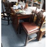 A MAHOGANY DROP-FLAP DINING TABLE with turned legs and two George III dining chairs