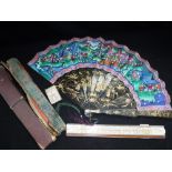 AN ORIENTAL HAND PAINTED PAPER FAN and a slide rule