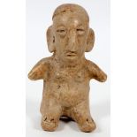 PRE-COLUMBIAN, TERRACOTTA FIGURE, H 6"seated figure with hands outstretched and legs extended.-