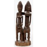 AFRICAN CARVED WOOD FIGURE OF 2 PEOPLE, H 17"Male and female seated figures with male figure