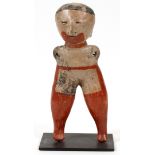 PRE-COLUMBIAN, TERRACOTTA FIGURE, H 10 1/2"Having a hollow head, long legs short torso, holes at the