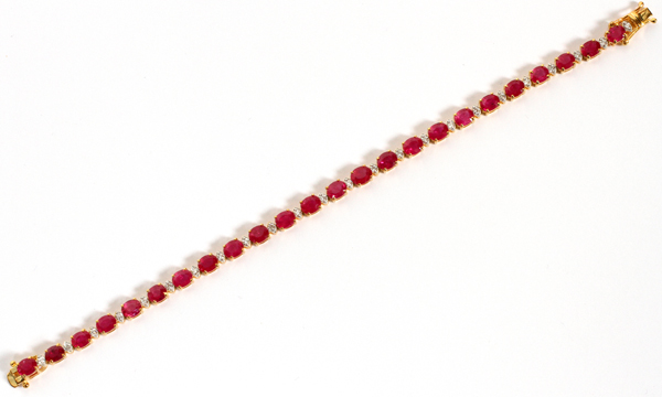 11.80CT NATURAL RUBY & .50CT DIAMOND BRACELET, L 7"Having 11.80ct oval natural rubies alternating