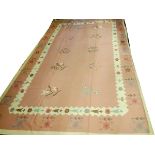 INDIAN DHURRIE, HAND WOVEN WOOL CARPET, W 9' 7 ", L 13' 7"Having a flat weave, pink ground with