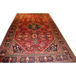 PERSIAN QASHQAI, HAND WOVEN WOOL, CARPET, W 10' 2", L 17' 3"Having six borders, red ground with a