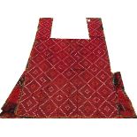 AFGHAN HAND WOVEN WOOL SADDLE COVER, W 3' 8", L 5' 10"Having a flat weave, red ground, with red