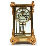 ANSONIA MANTLE CLOCK, 1902 H 12", W 7"Ansonia Clock Co., New York. Gilt metal case, Roman numerals