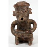 PRE-COLUMBIAN, TERRACOTTA FIGURE, H 5"Seated figure, having a hole in the top of the head and