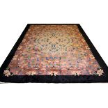 CHINESE ART DECO STYLE CARPET, W 9', L 11' 5"Having a large black border with a salmon ground. Large