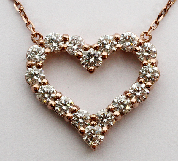 14KT ROSE GOLD AND 1.52CT DIAMOND NECKLACE, L 16"A pendant heart form necklace set with 1.52ct