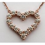 14KT ROSE GOLD AND 1.52CT DIAMOND NECKLACE, L 16"A pendant heart form necklace set with 1.52ct