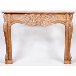 CARVED WALNUT FIREPLACE MANTEL, H 55", W 74", D 11"Having carved walnut contoured front posts,