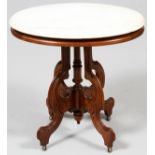 AMERICAN, MARBLE TOP, WALNUT TABLE, H 29", W 29", D 24"Having an oval white marble top with an oak