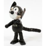 SCHOENHUT WOODEN FELIX THE CAT DOLL, H 8"A jointed doll with movable arms, legs, ears and tail.