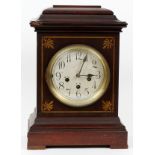 UNGHAN'S MAHOGANY MANTEL CLOCK, H 15", W 11"Having a three key wind, with gold tone stencil design