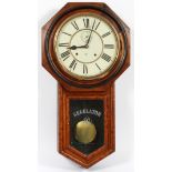 ANSONIA REGULATOR SCHOOL CLOCK H 32", L 17.5"Case having an octagonal shape at the top with brass