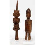 CARVED WOOD FIGURES, 2 PCS., H 9 - 12"One figure having a feathered headdress with an integral