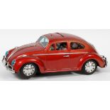 BANDAI BEETLE VW TIN TOY CAR, L 15"Painted red with sun roof, blue headlight lenses.wear to the