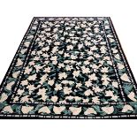 CHINESE, HAND WOVEN WOOL, RUG, W 8'10", L 11' 10"Chinese hand woven wool rug having a navy ground, 1