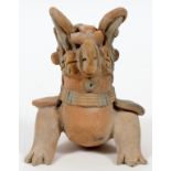 PRE-COLUMBIAN, TERRACOTTA ANIMAL, H 5"A bird like animal with decorated and painted headress.- For