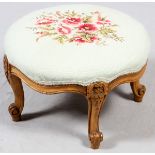 WALNUT & NEEDLEPOINT FOOT STOOL, H 11", DIA 18"Having a walnut frame with cabriolet legs and red