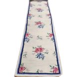 INDIAN DHURRIE, HAND WOVEN WOOL RUNNER, W 2' 7", L 10' 1"Having a flat weave, ivory ground with
