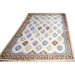 INDIAN DHURRIE, HAND WOVEN WOOL RUG, W 9' 3", L 11' 7"Having a flat weave, beige ground, two borders
