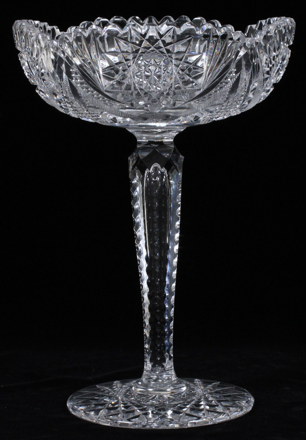 CUT CRYSTAL COMPOTE, H 11"A cut crystal compote, decorated with a notched tapered stem, and sunburst