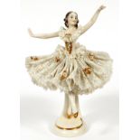 GERMAN PORCELAIN BALLERINA, H 7"Marked "Germany" at the underside and marked in blue at the back.