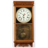 CALENDAR REGULATOR WALL CLOCK, H 37", L 16.5"Featuring carved oak crown molding above a full