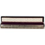 M. HOHNER GERMAN OVERSIZED HARMONICA, 3 PIECES, L 23"Having a wood comb, metal cover plate, and