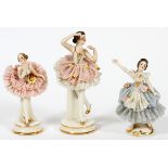 GERMAN PORCELAIN BALLERINAS THREE PIECES, H 3 3/8" - 4 1/8"All are marked at the underside.Light