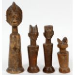 AFRICAN CARVED WOOD FIGURES, 4 PCS., H 4 - 8"Appear to ceremonial figures/priests.- For High