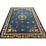 ANTIQUE CHINESE HAND WOVEN WOOL RUG, W 8' 10", L 11' 4"Antique Chinese hand woven wool rug having