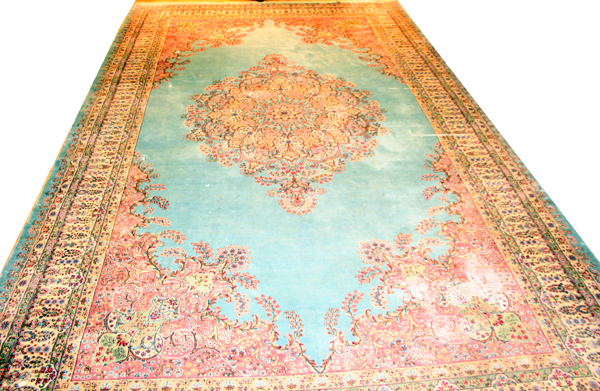 PERSIAN KERMAN, HAND WOVEN WOOL CARPET, W 11' 8", L 20'Having a light blue ground, six borders, pink