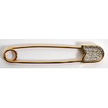 14 KT GOLD SAFETY PIN WITH PAVE DIAMONDS TW. 3 GR H 3/8'' W 2''makers mark JMGood condition. Lk.-