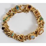 14KT YELLOW GOLD SLIDE BRACELET WITH GEM STONES L 7''Emerald, garnet, opal and topaz stones; TW.33.7