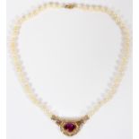 LADY'S 3.5 CTS AMETHYST, DIAMOND AND 6MM PEARL NECKLACE, L 16 1/2"Having a large oval cut amethyst